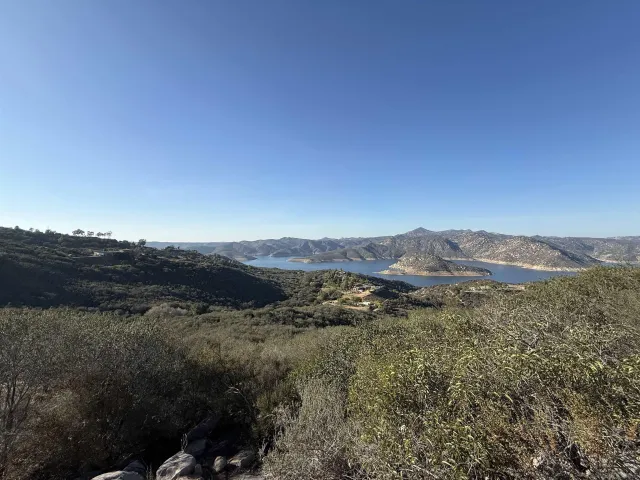 a view of a mountain with mountains in the background