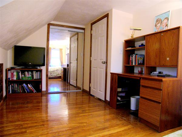 64 Bertwell Road Lexington, MA 02420 - Photo 13 of 18 a view of living room with furniture and wooden floor
