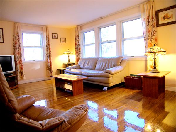 64 Bertwell Road Lexington, MA 02420 - Photo 2 of 18 a living room with furniture and a window