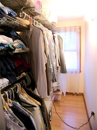 64 Bertwell Road Lexington, MA 02420 - Photo 9 of 18 a view of walk in closet with clothes and shoes