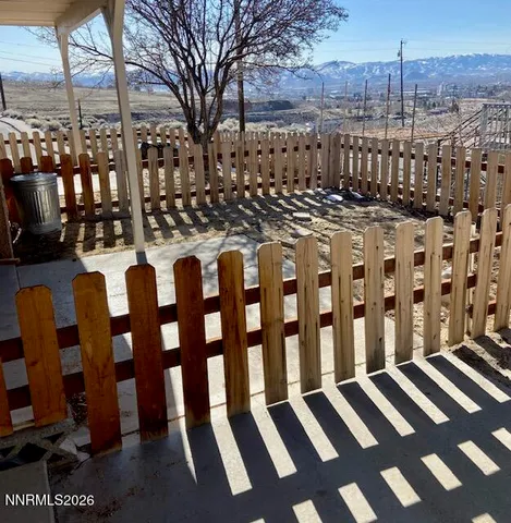a view of a balcony with city view