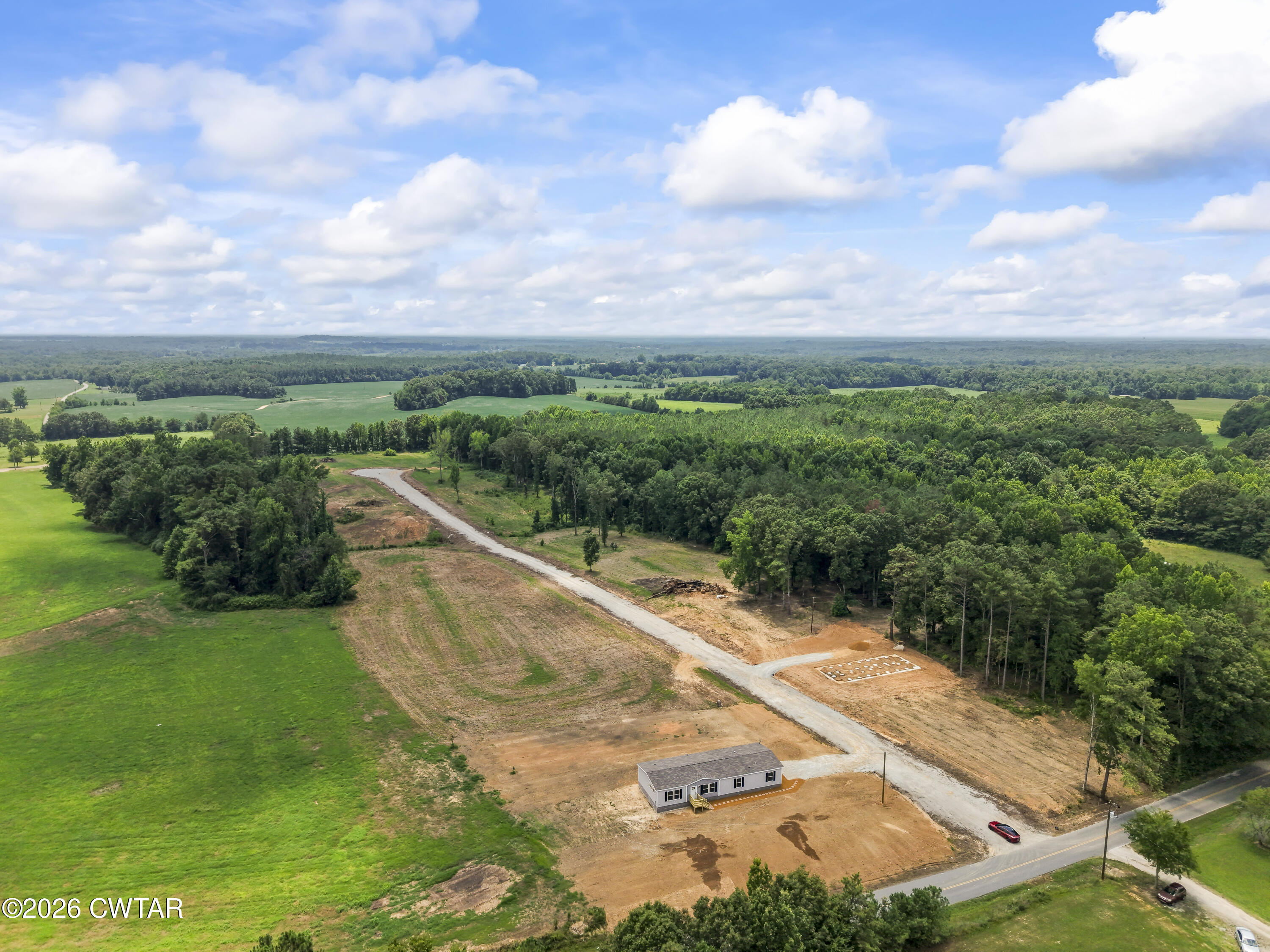 3045 Clifford Road Henderson, TN 38340 - Photo 26 of 28 DJI_20260703131433_0103_D