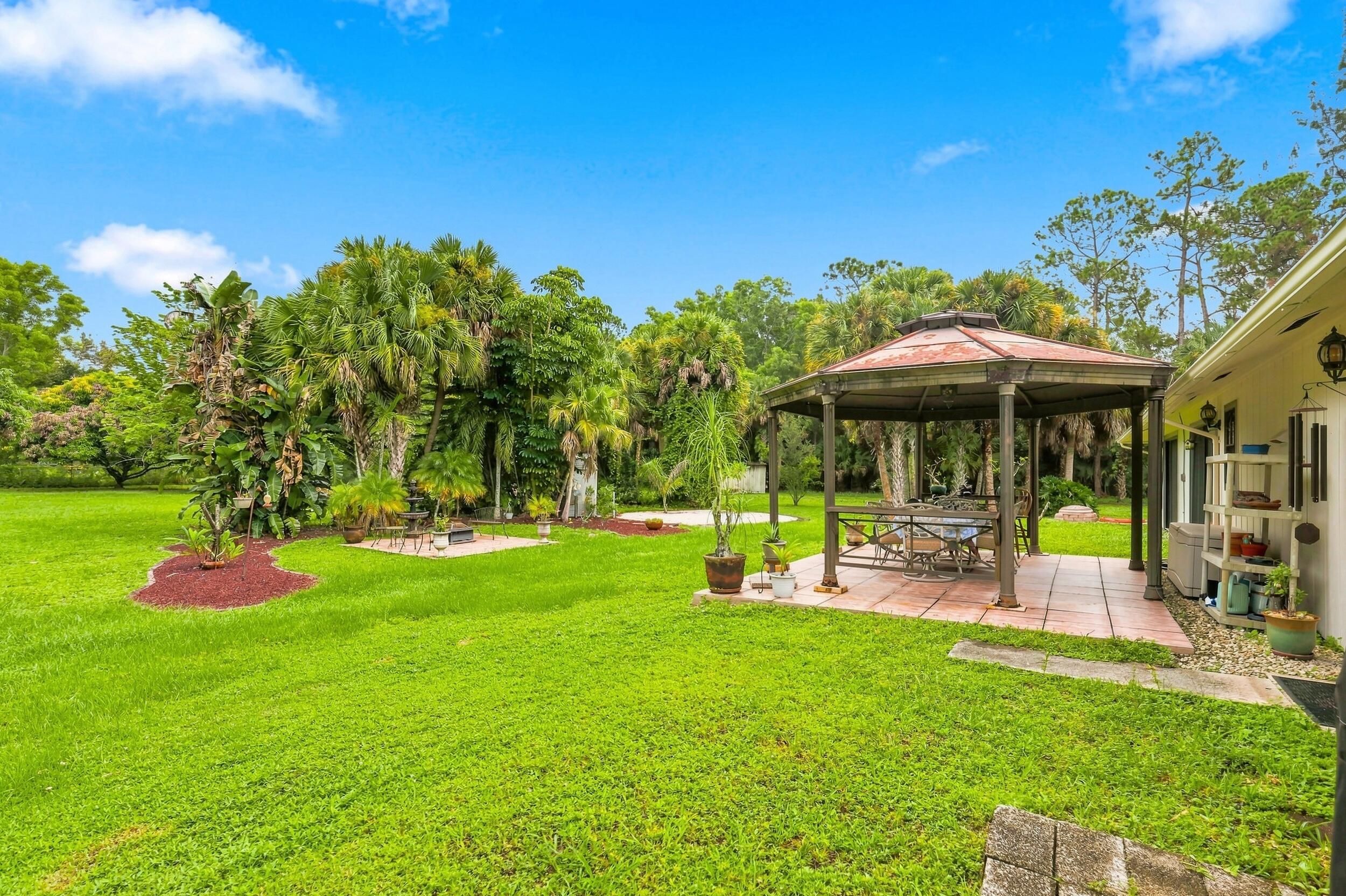 12871 Compton Road Loxahatchee Groves, FL 33470 - Photo 38 of 51 Expansive Backyard