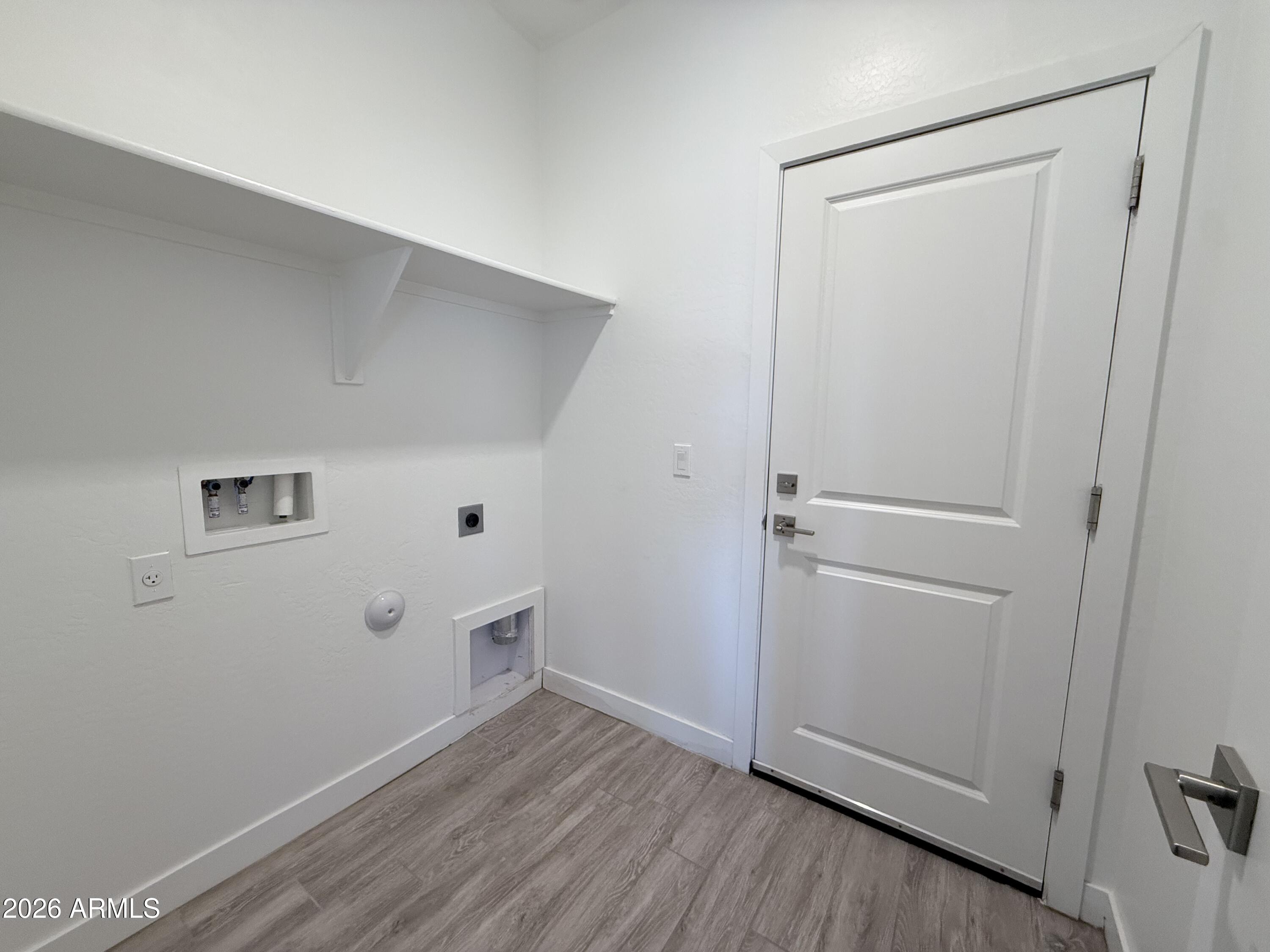 21333 West Sleepy Ranch Road Wittmann, AZ 85361 - Photo 5 of 23 laundry area