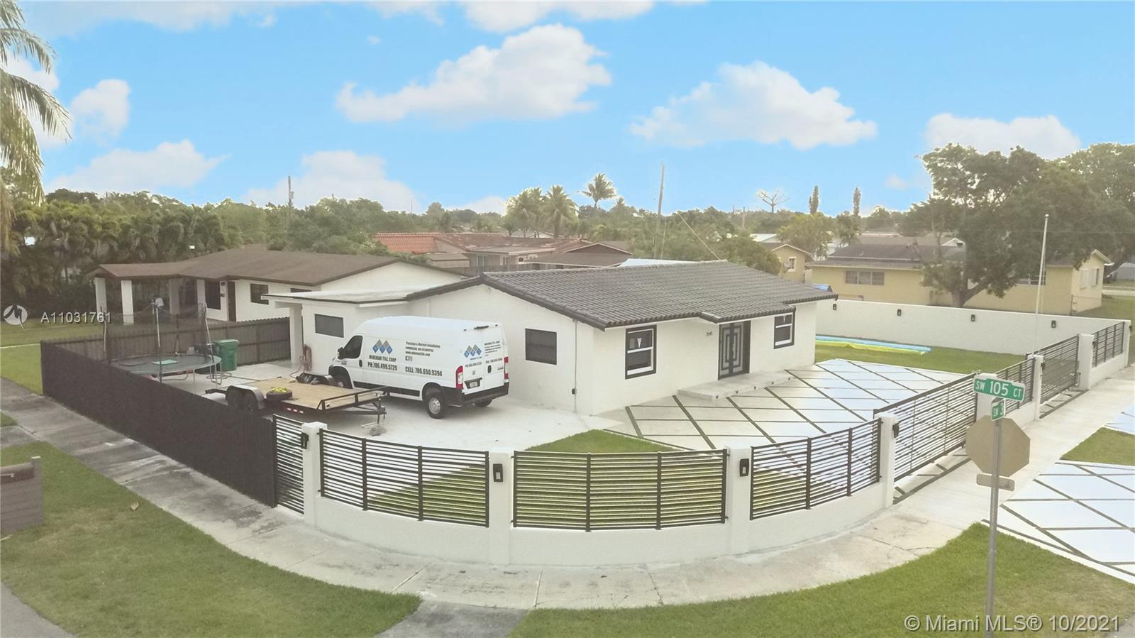 3541 Southwest 105th Court Miami, FL 33165 - Photo 2 of 45 a view of a house with roof deck