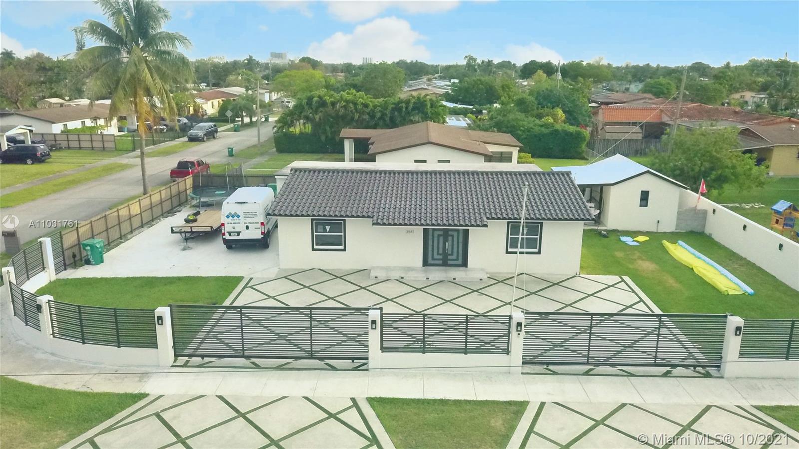 3541 Southwest 105th Court Miami, FL 33165 - Photo 3 of 45 a view of a house with a yard
