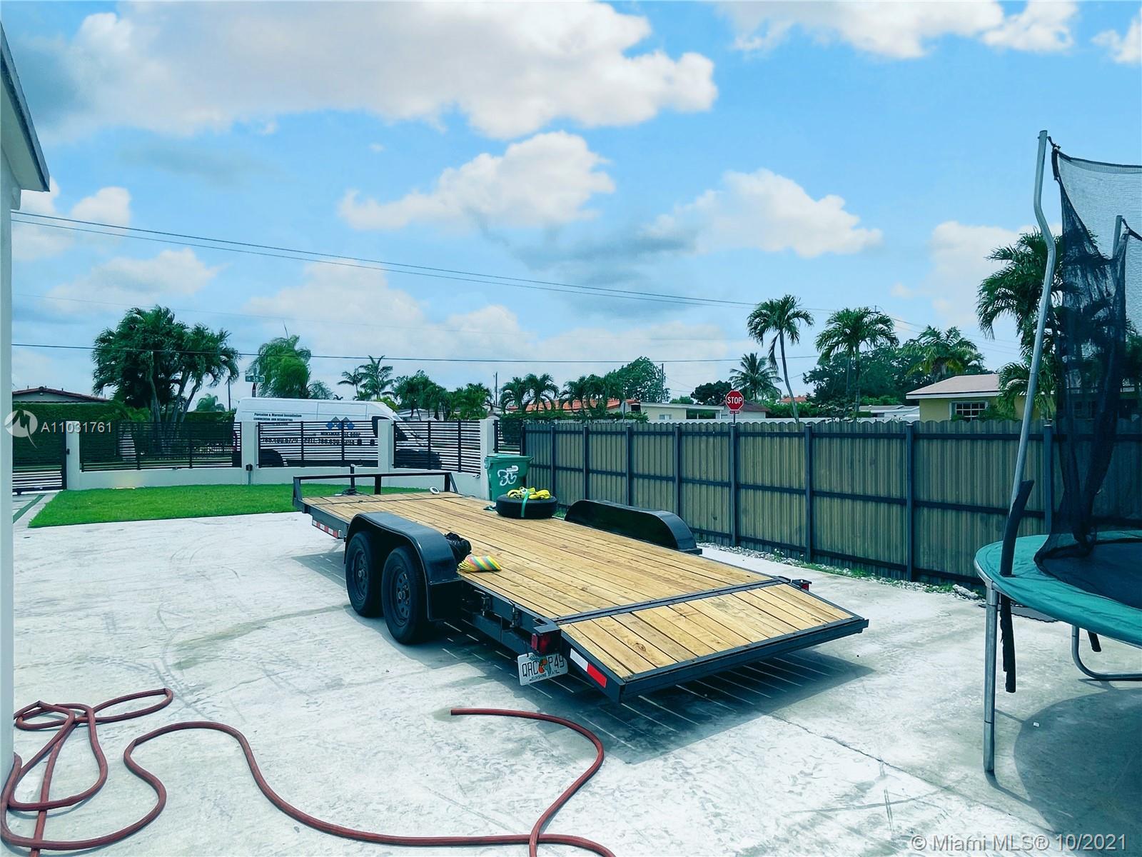 3541 Southwest 105th Court Miami, FL 33165 - Photo 40 of 45 a view of a backyard with swimming pool and furniture