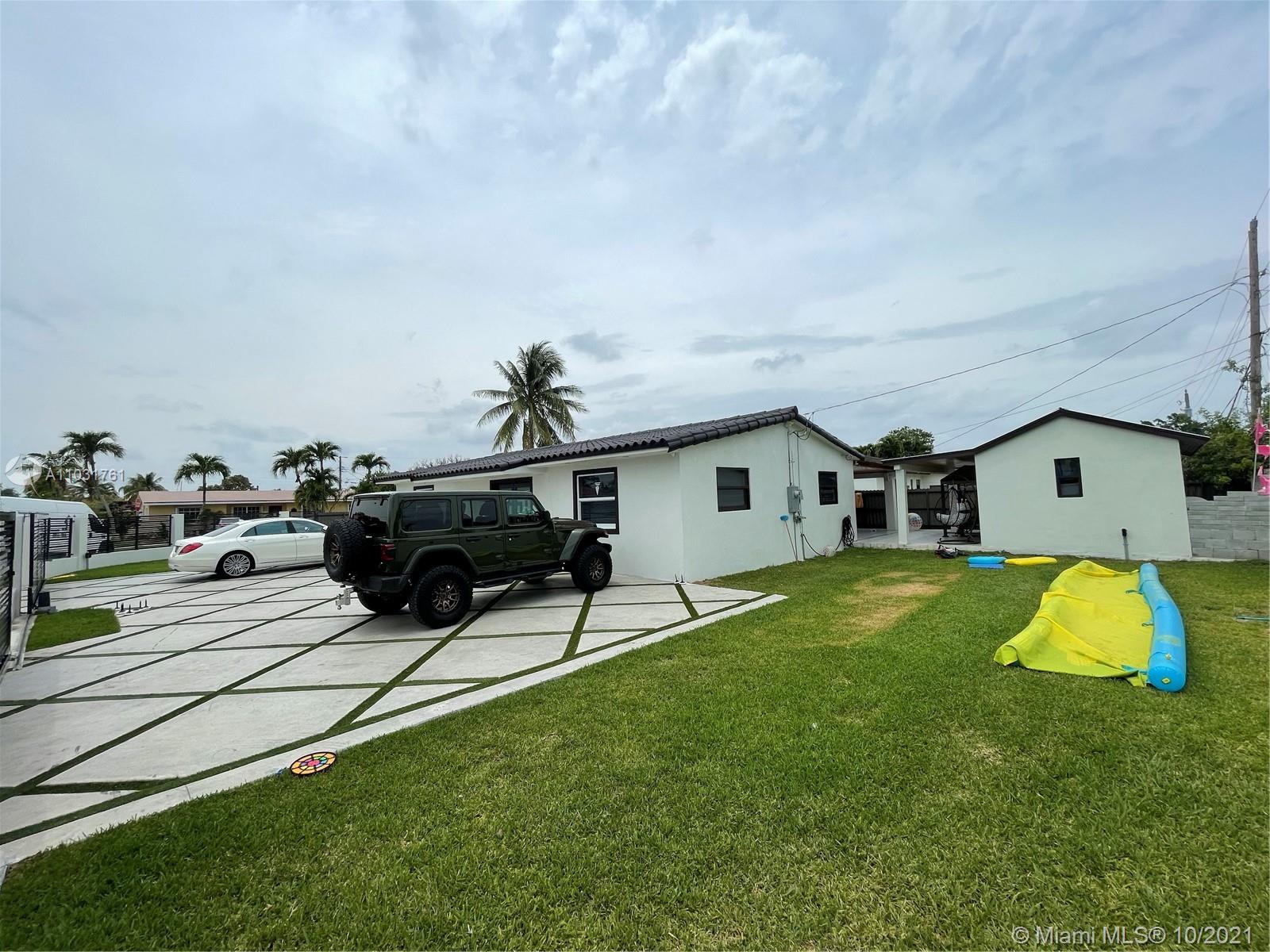 3541 Southwest 105th Court Miami, FL 33165 - Photo 43 of 45 a aerial view of a house with swimming pool and porch