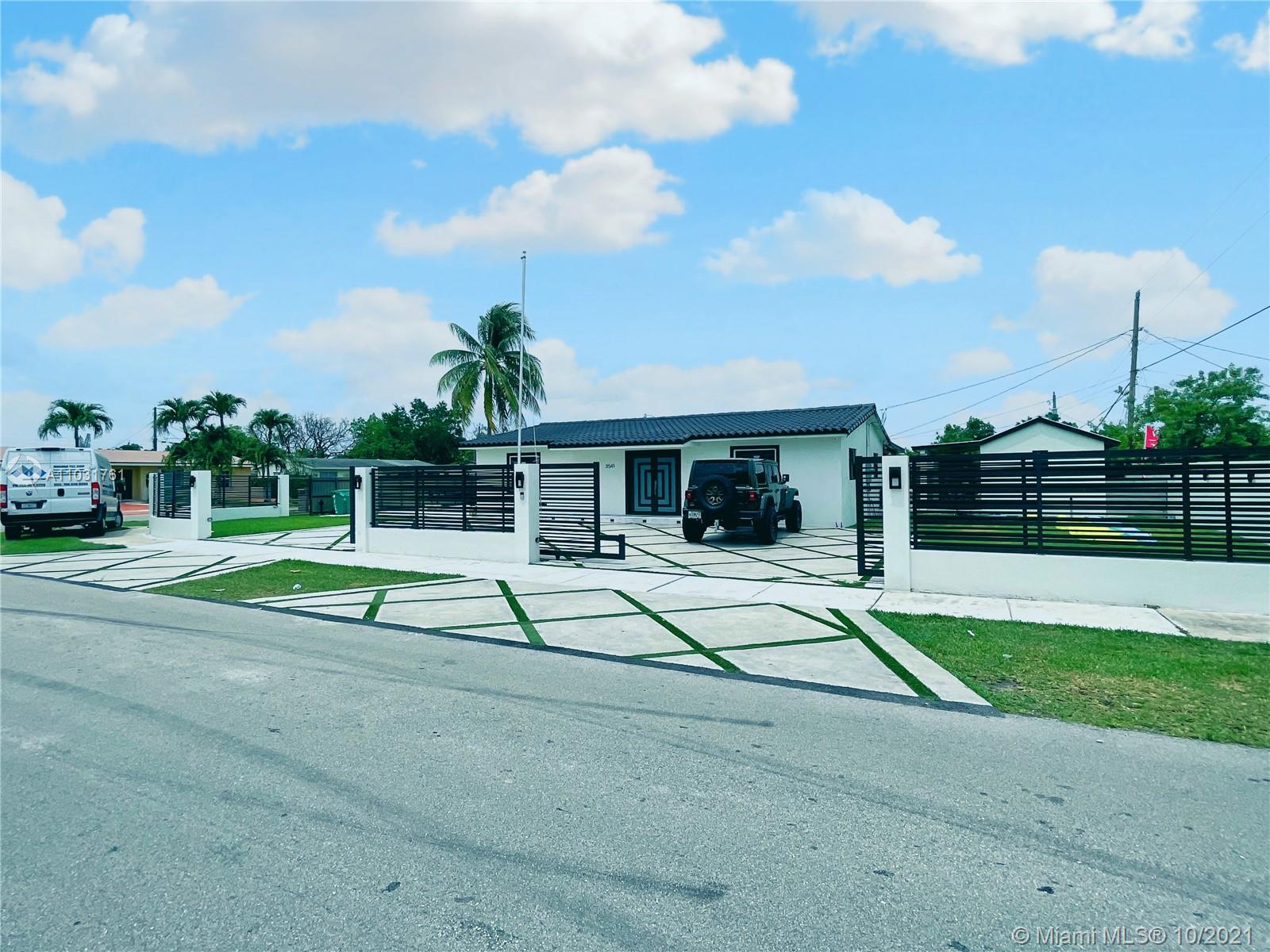 3541 Southwest 105th Court Miami, FL 33165 - Photo 6 of 45 a house view with a garden space
