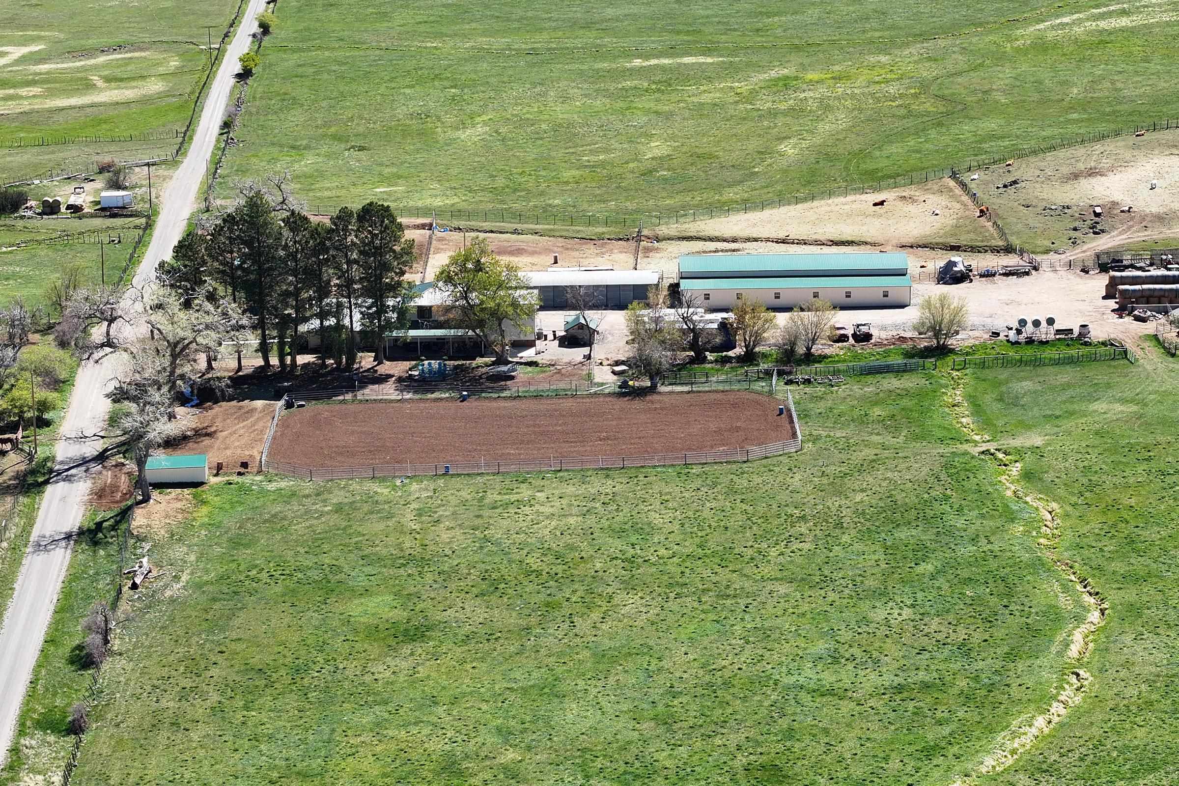 58749 Oe Road Collbran, CO 81624 - Photo 34 of 42 a view of a big yard with table and chairs