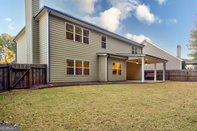 wooden floor in an empty room with a fireplace