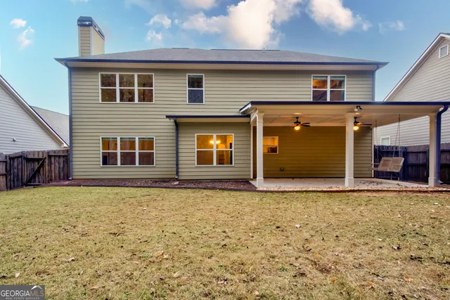 a view of kitchen with furniture and wooden floor