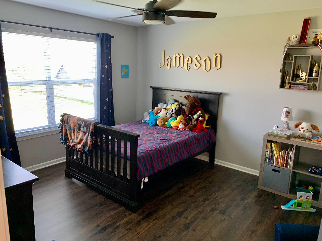 1493 North 3045th Road Ottawa, IL 61350 - Photo 13 of 23 a bedroom with a bed and wooden floor