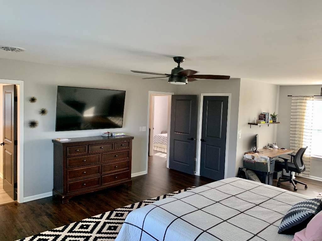 1493 North 3045th Road Ottawa, IL 61350 - Photo 17 of 23 a bedroom with a bed and a flat screen tv