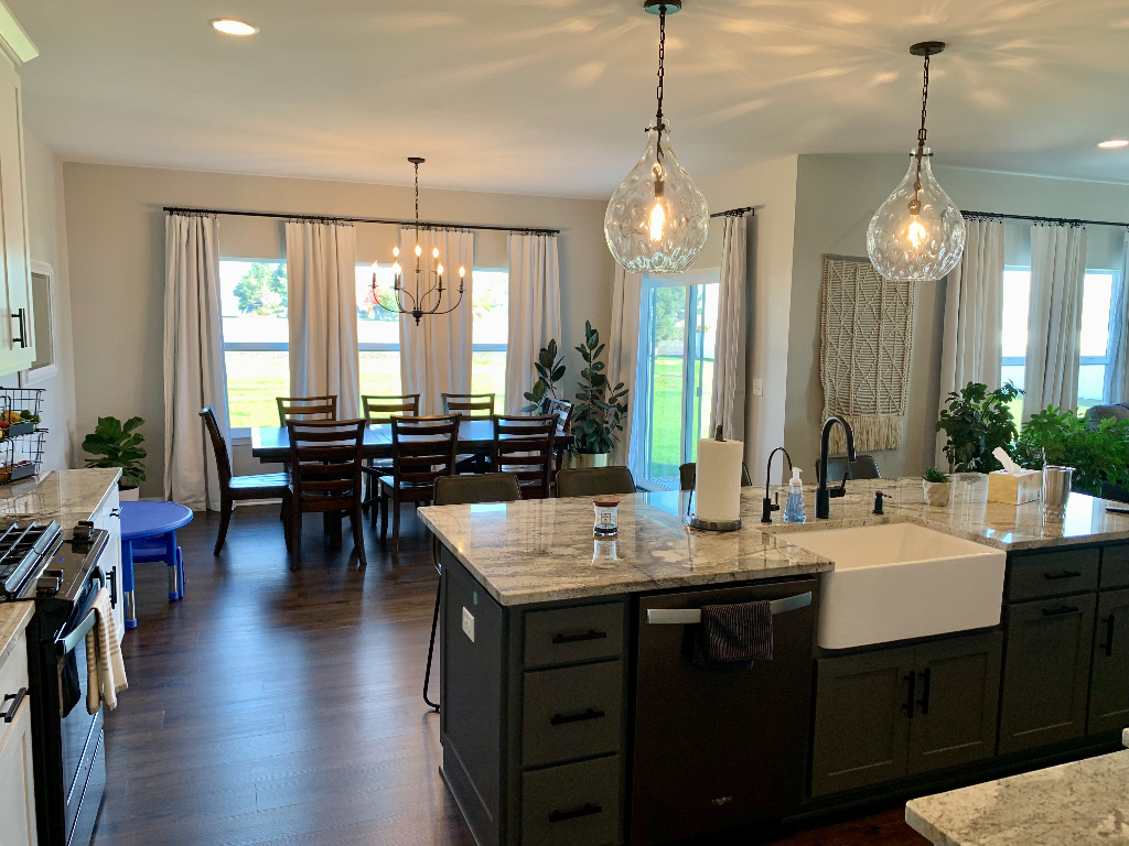 1493 North 3045th Road Ottawa, IL 61350 - Photo 3 of 23 a large kitchen with a table and chairs