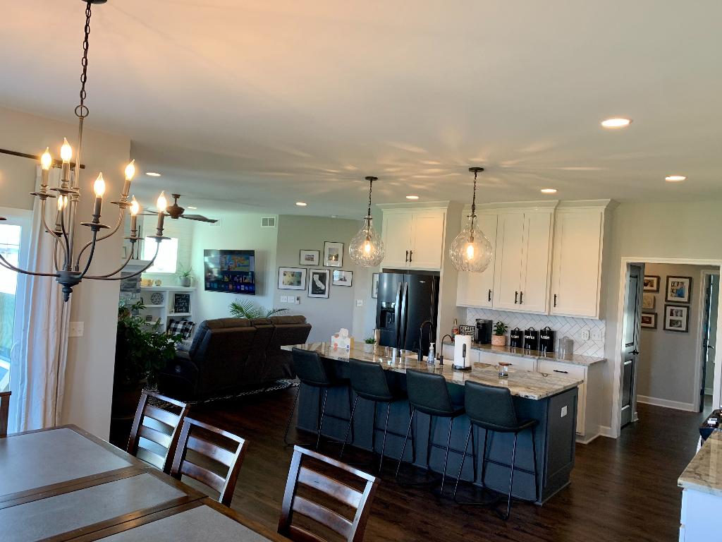 1493 North 3045th Road Ottawa, IL 61350 - Photo 23 of 23 a living room with furniture a dining table and kitchen view