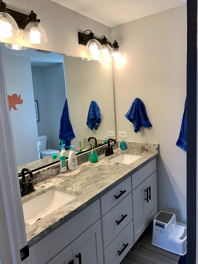 1493 North 3045th Road Ottawa, IL 61350 - Photo 10 of 23 a bathroom with a granite countertop sink and a mirror