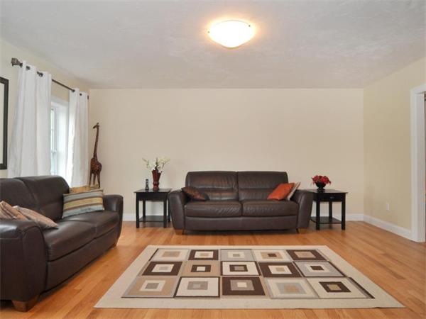 14 Hatch Road Wrentham, MA 02093 - Photo 15 of 28 a living room with furniture and a rug