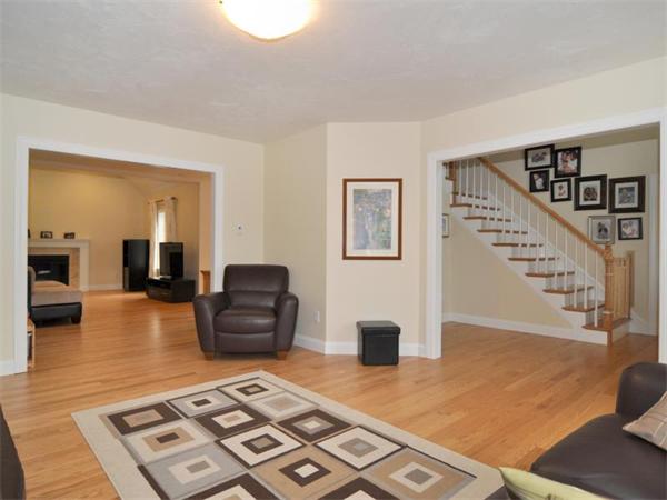 14 Hatch Road Wrentham, MA 02093 - Photo 16 of 28 a living room with furniture and a rug