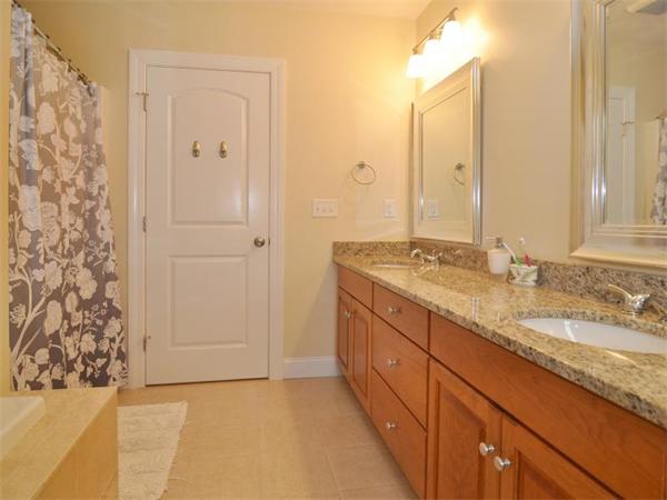 14 Hatch Road Wrentham, MA 02093 - Photo 26 of 28 a bathroom with a granite countertop sink and a mirror