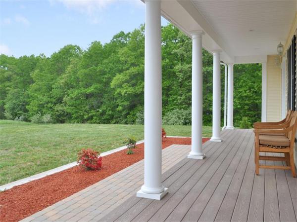 14 Hatch Road Wrentham, MA 02093 - Photo 5 of 28 a view of a wooden deck and a yard