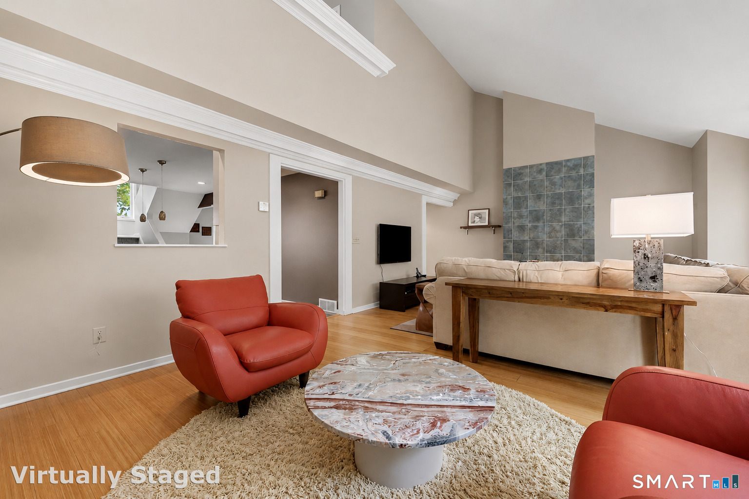 690 Forest Road, Unit 642 West Haven, CT 06516 - Photo 7 of 40 Spacious 17x26 living room big enough to have a separate reading/conversational nook with peek through to Kitchen.