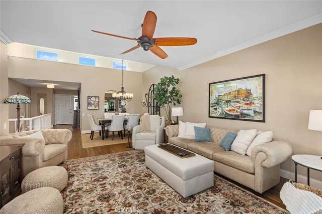 a view of a porch with furniture and a yard