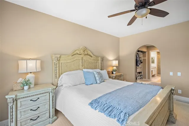 a bathroom with a granite countertop sink mirror and shower