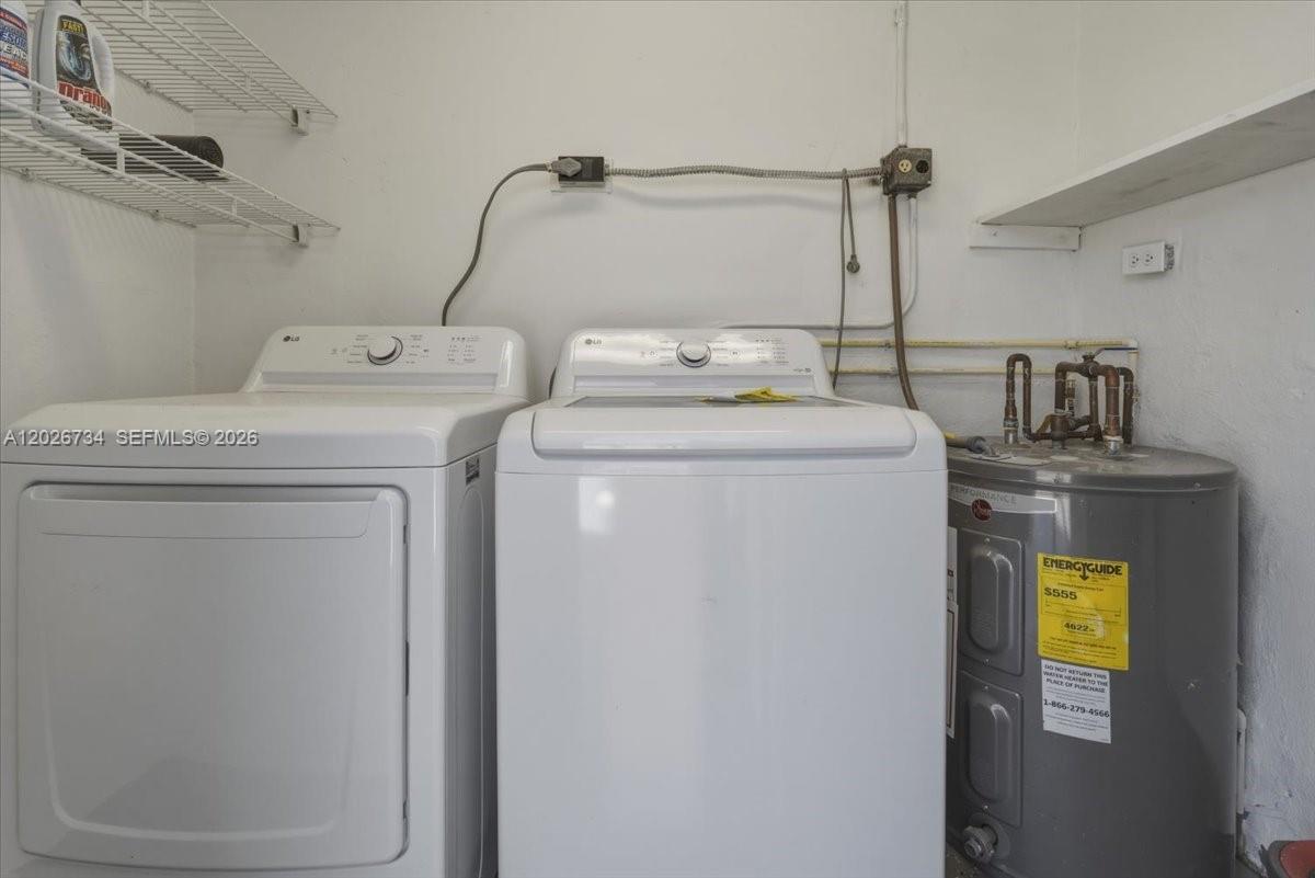 266 Southwest 6th Street Dania Beach, FL 33004 - Photo 25 of 37 a utility room with dryer and washer