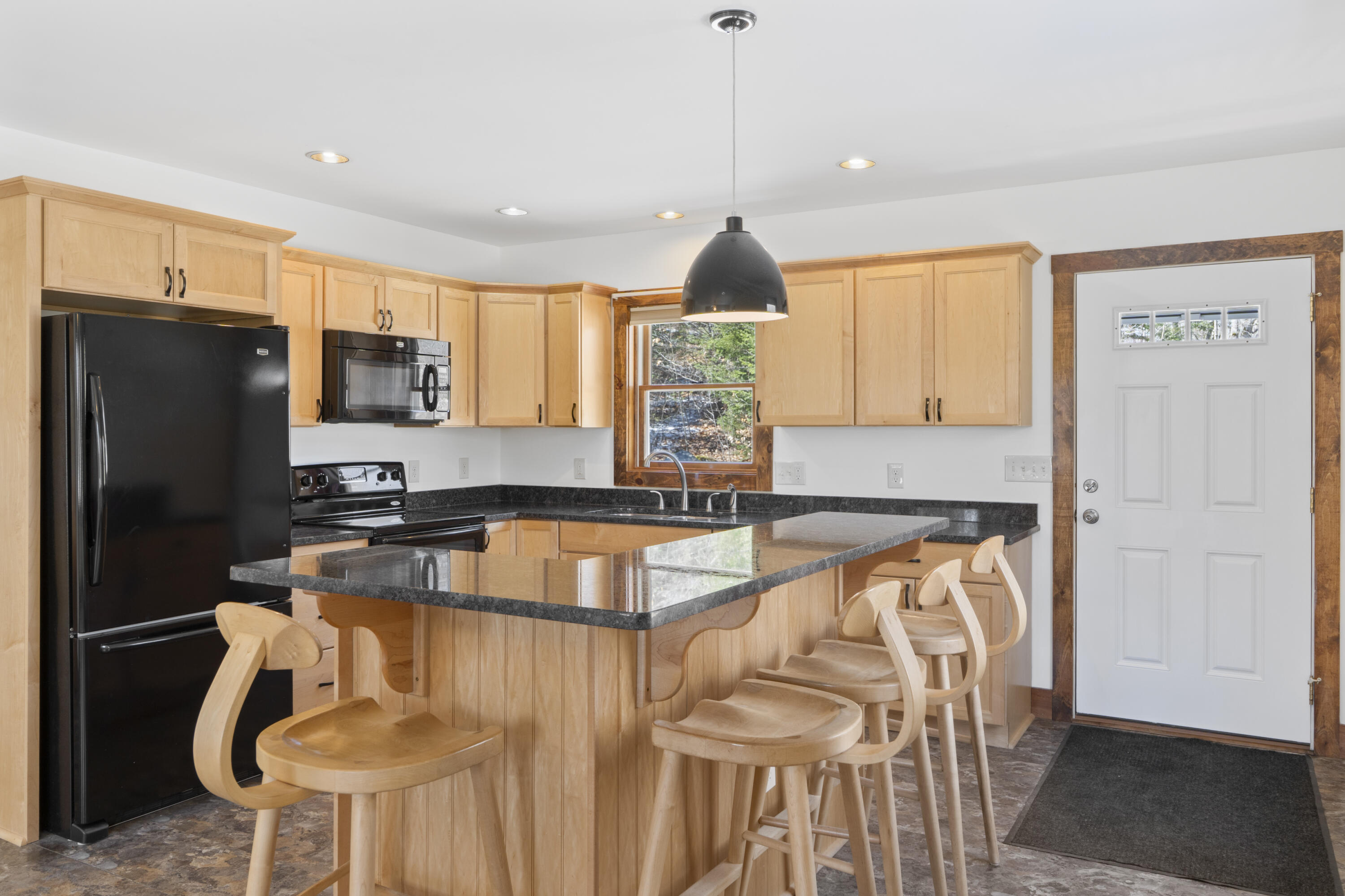 608 Waterford Road Norway, ME 04268 - Photo 7 of 47 Kitchen, Island & Front Door