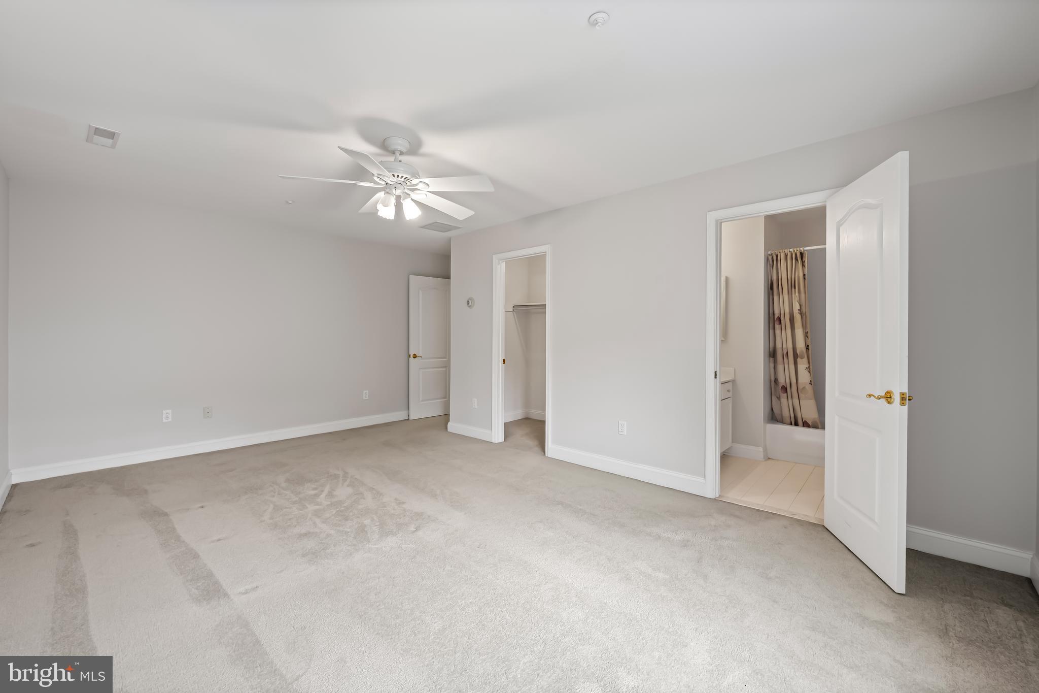 24 Roland Green, Unit 12 Baltimore, MD 21210 - Photo 31 of 53 an empty room with fan and entryway