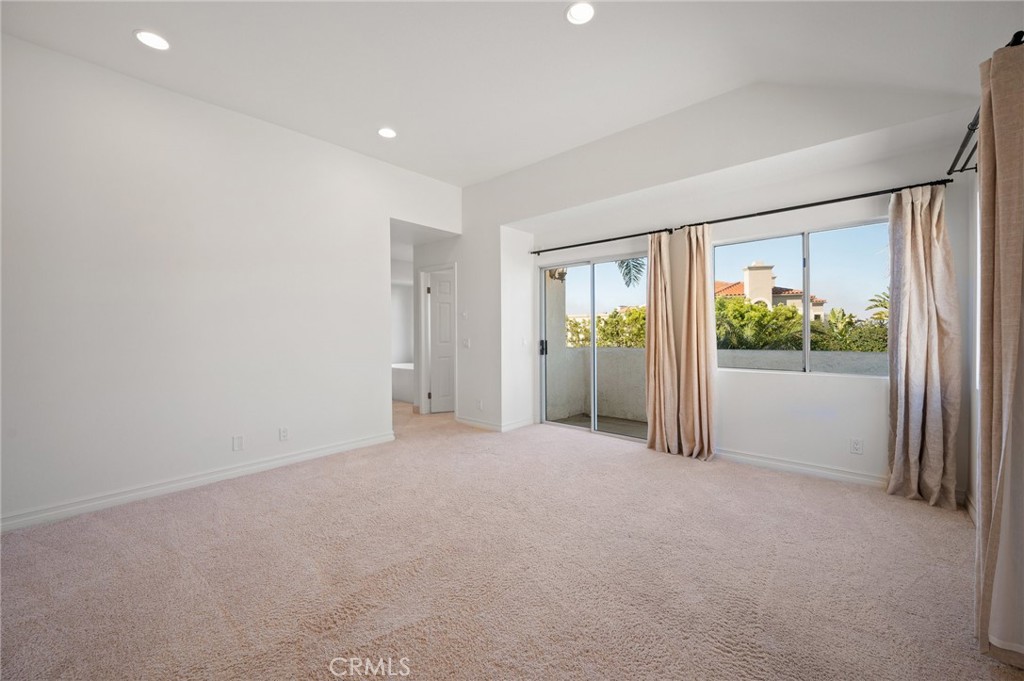 17 St John Dana Point, CA 92629 - Photo 16 of 30 a view of an empty room with a sliding door