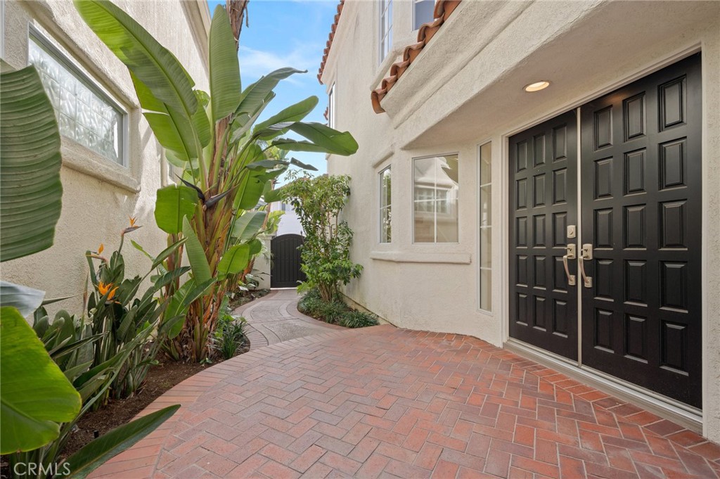 17 St John Dana Point, CA 92629 - Photo 24 of 30 a potted plant sitting in front of a building