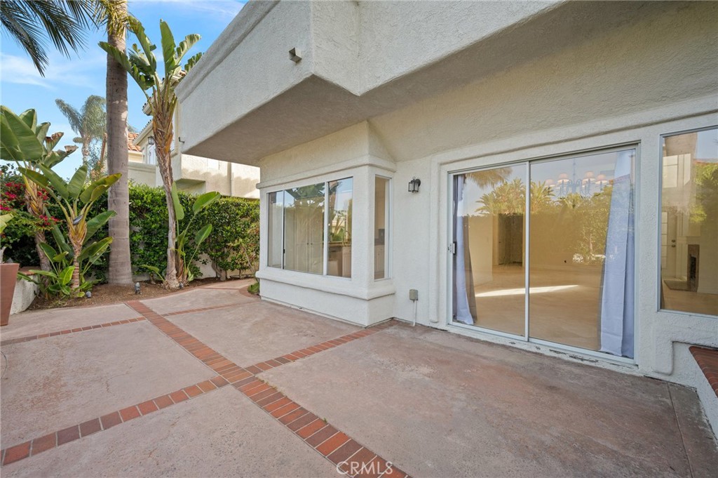 17 St John Dana Point, CA 92629 - Photo 26 of 30 a view of a room with a large window and potted plants