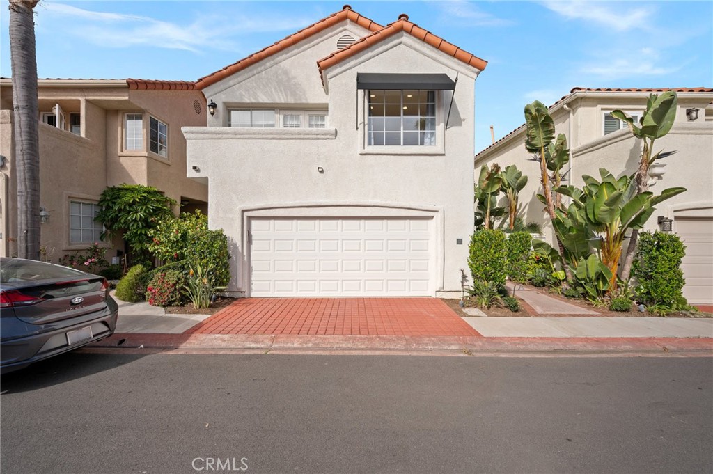 17 St John Dana Point, CA 92629 - Photo 30 of 30 a front view of a house with a yard and garage