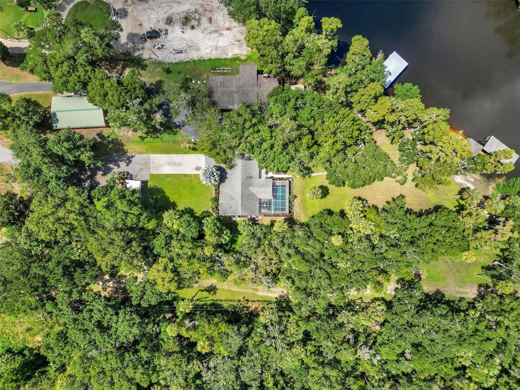 11624 Monette Road Riverview, FL 33569 - Photo 1 of 1 an aerial view of a house with a yard and large trees