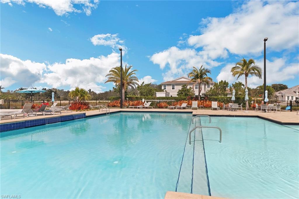 4687 Arboretum Circle, Unit 101 Naples, FL 34112 - Photo 28 of 30 a view of a lake