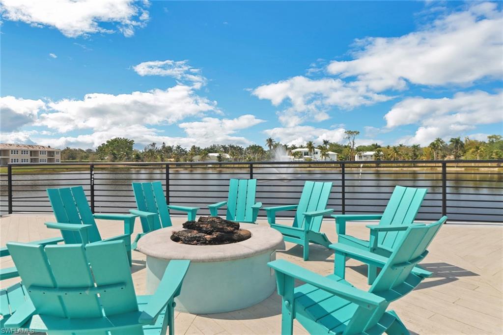 4687 Arboretum Circle, Unit 101 Naples, FL 34112 - Photo 30 of 30 a view of a chair and table on the terrace