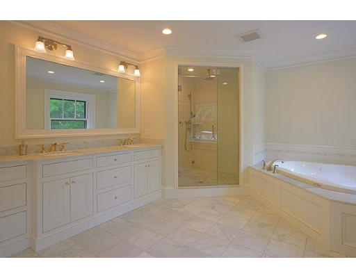 57 Upland Road Brookline, MA 02445 - Photo 5 of 7 a bathroom with a granite countertop sink mirror and bathtub