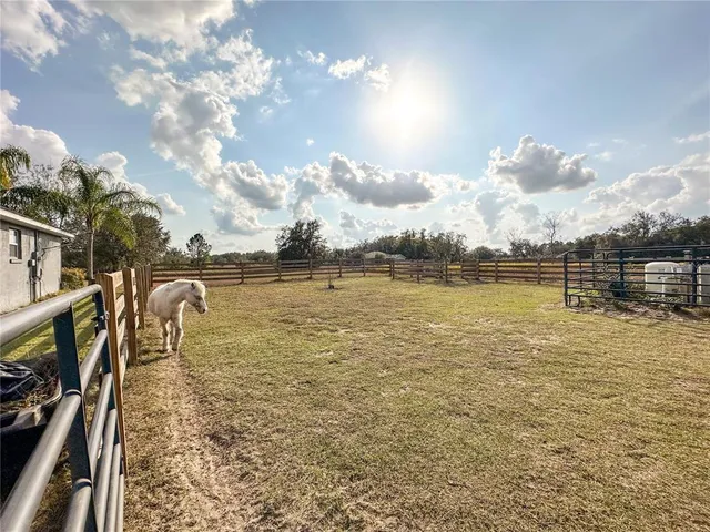 a view of residential houses with outdoor space