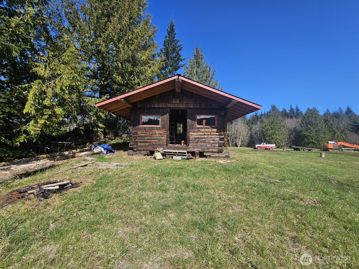 9999 Crescent Beach Road Port Angeles, WA 98363 - Photo 11 of 28 a front view of house with yard and trees
