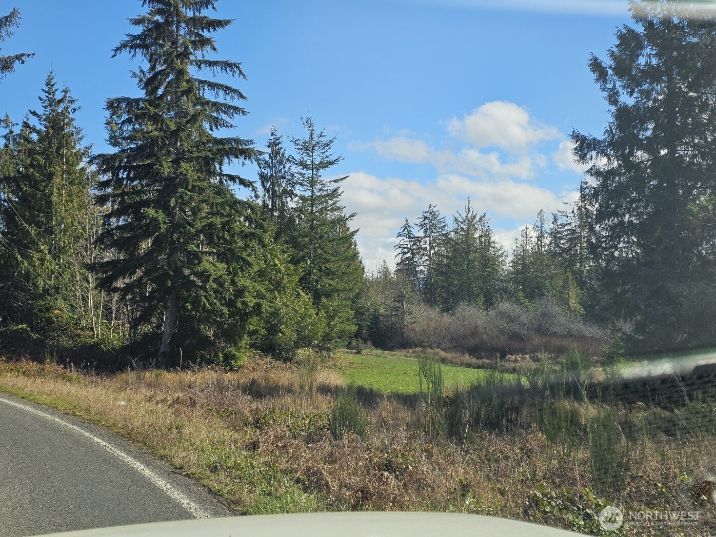 9999 Crescent Beach Road Port Angeles, WA 98363 - Photo 24 of 28 a view of a lake from a yard
