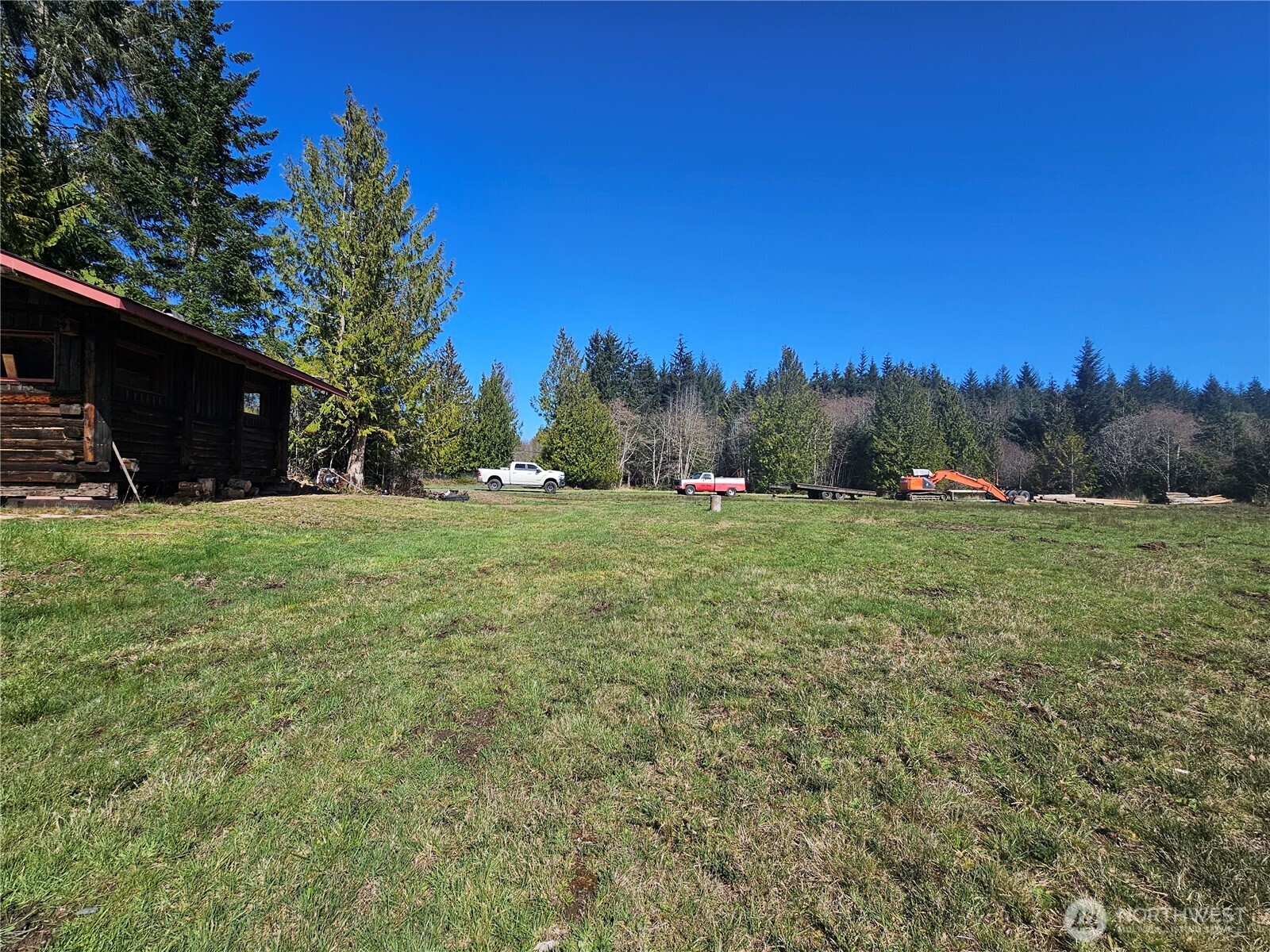 9999 Crescent Beach Road Port Angeles, WA 98363 - Photo 28 of 28 a view of a field with trees in the background