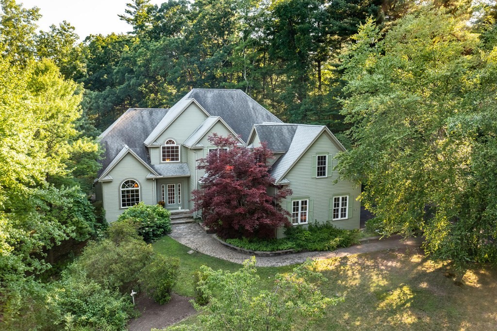 150 East Leverett Road Amherst, MA 01002 - Photo 1 of 42 a front view of house with garden