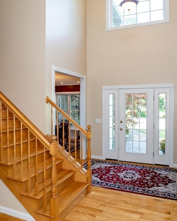 150 East Leverett Road Amherst, MA 01002 - Photo 12 of 42 a view of staircase with wooden floor