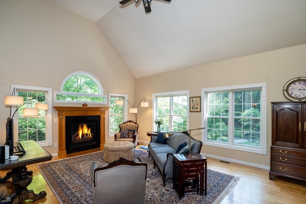 150 East Leverett Road Amherst, MA 01002 - Photo 13 of 42 a living room with furniture and a fireplace