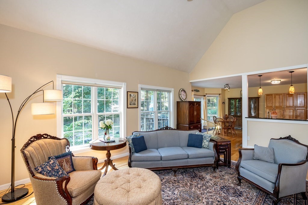 150 East Leverett Road Amherst, MA 01002 - Photo 14 of 42 a living room with furniture and a large window