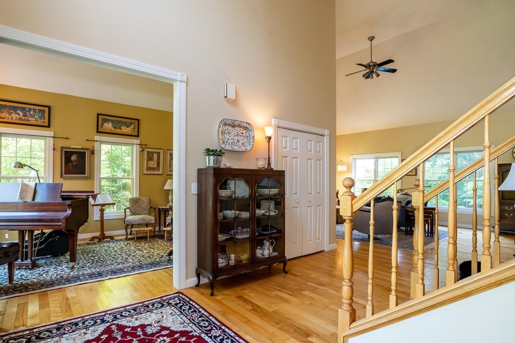 150 East Leverett Road Amherst, MA 01002 - Photo 22 of 42 a living room with furniture ceiling fan and a rug
