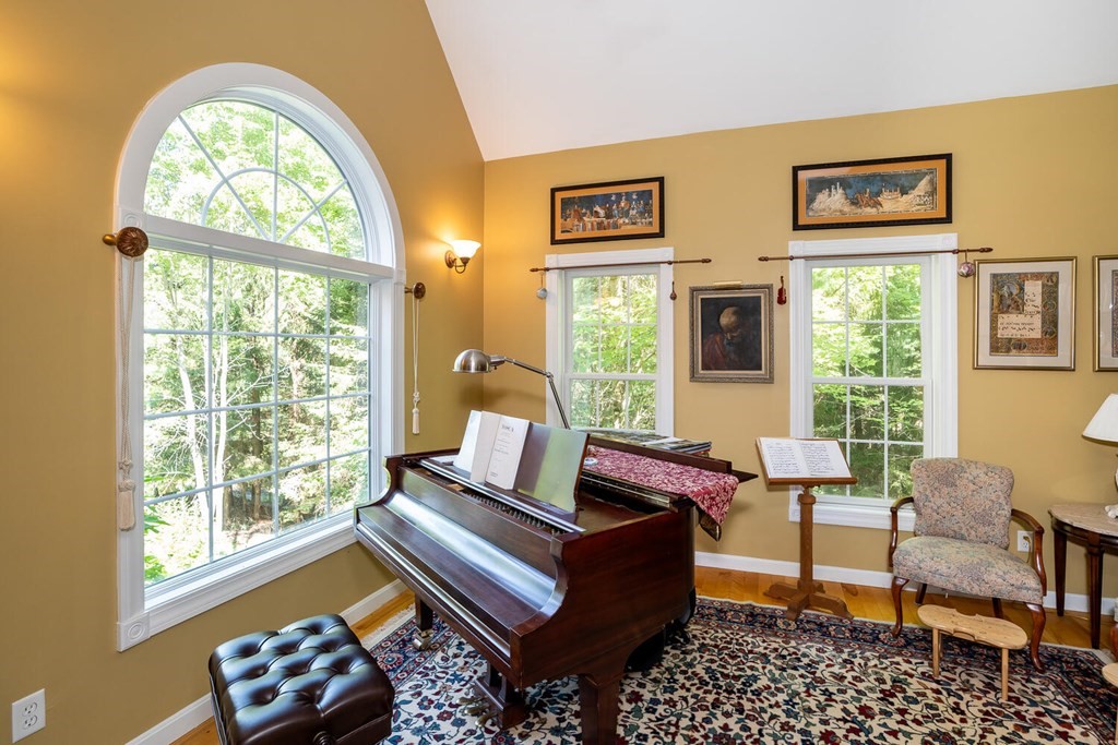 150 East Leverett Road Amherst, MA 01002 - Photo 23 of 42 a living room with furniture and a window