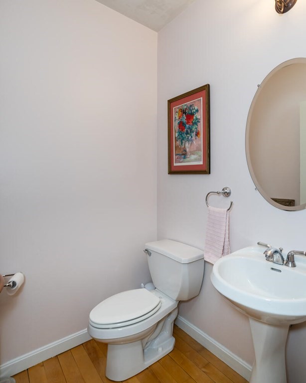 150 East Leverett Road Amherst, MA 01002 - Photo 26 of 42 a white toilet sitting next to a bathroom sink